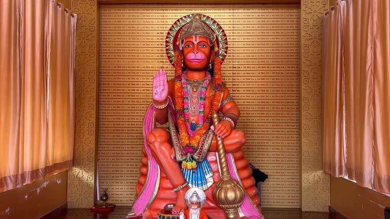 A colourful sculpture or idol of the Indian god, Lord Hanuman. Statue of the Deity Hanuman